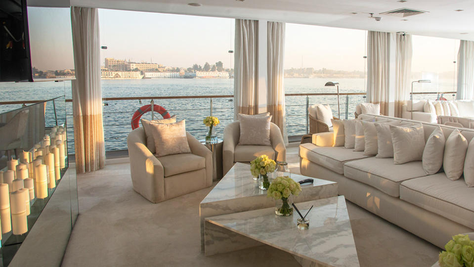 The superyacht’s large windows give a great view of the Nile. - Credit: Barry Iverson