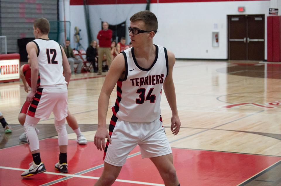 Terrier junior Simon Collins (34) became the second Litchfield boys basketball player to win an athlete of the week award. Collins won in week 10.