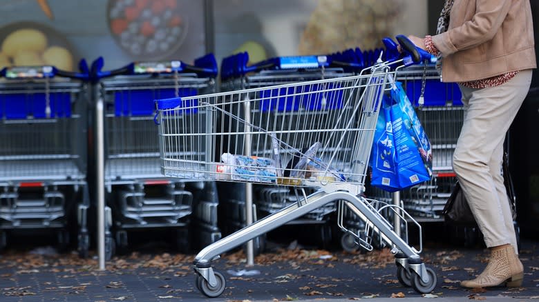 customer pushing Aldi cart