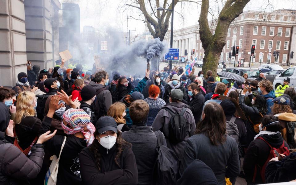 Smoke bombs were let off by the protesters