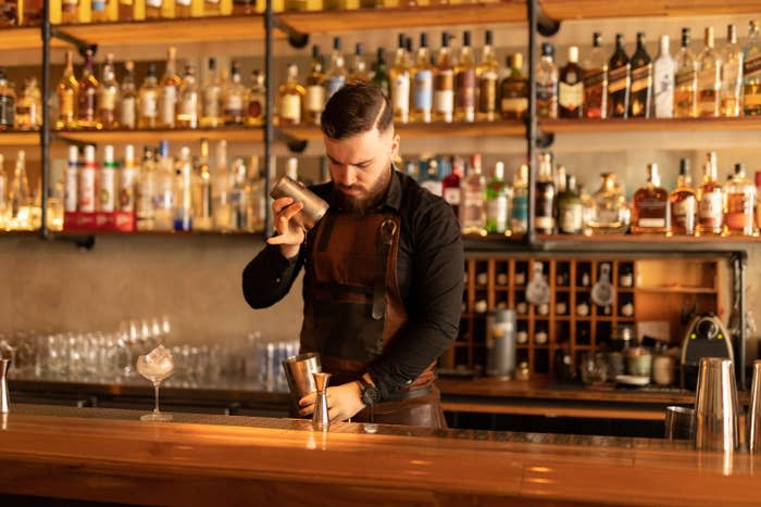 A bartender preparing a drink