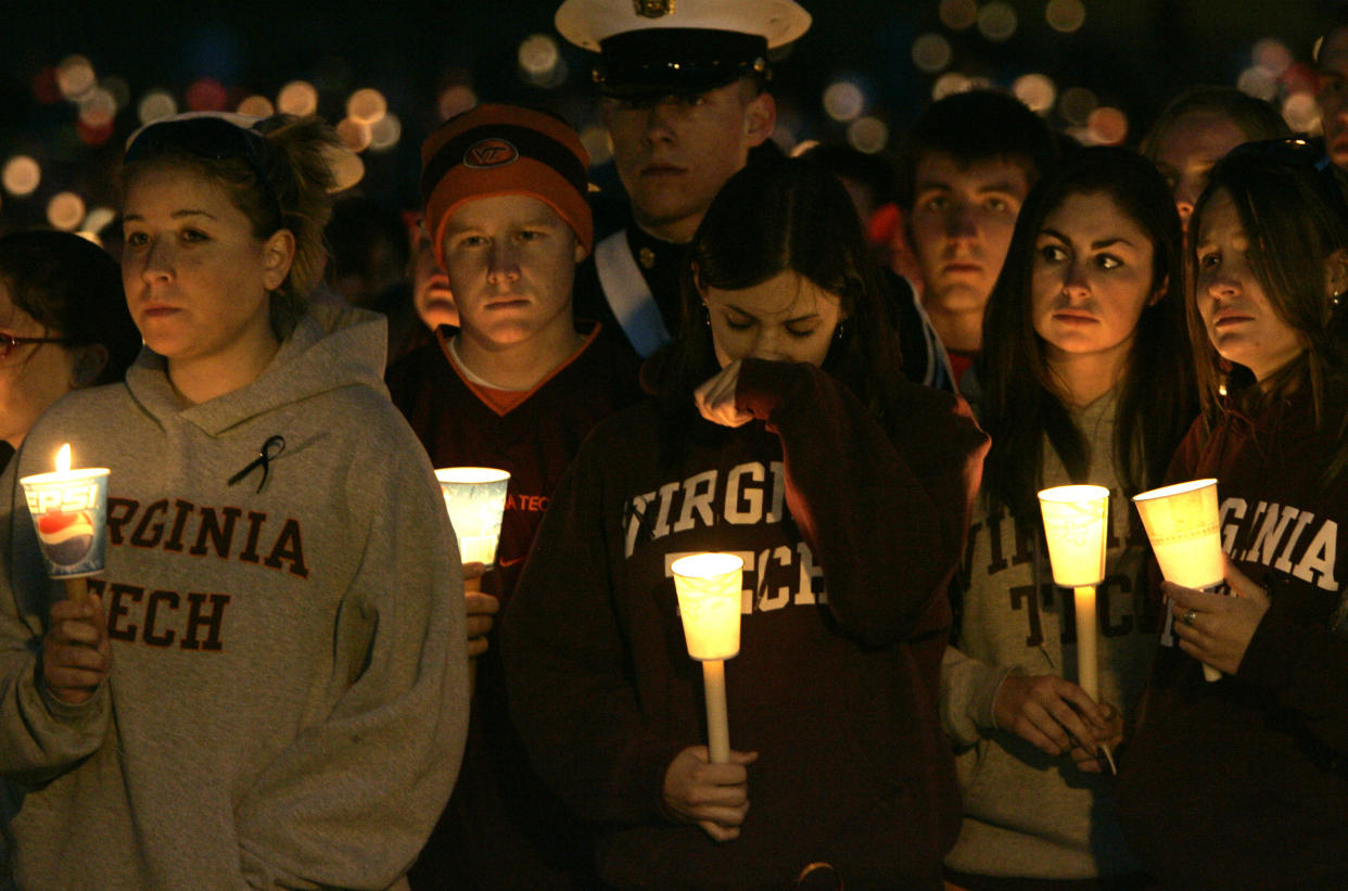 Students at a candlelight vigil for the victims of the shooting at Virginia Tech