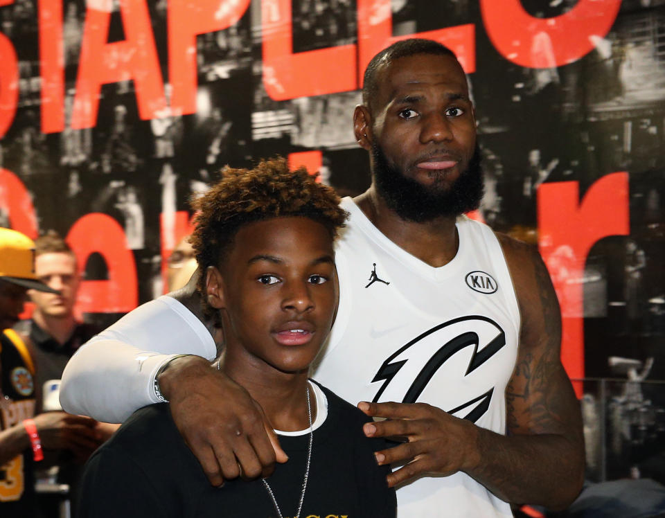 LeBron James and his son, LeBron Jr., at All-Star Weekend in Los Angeles. (Getty)