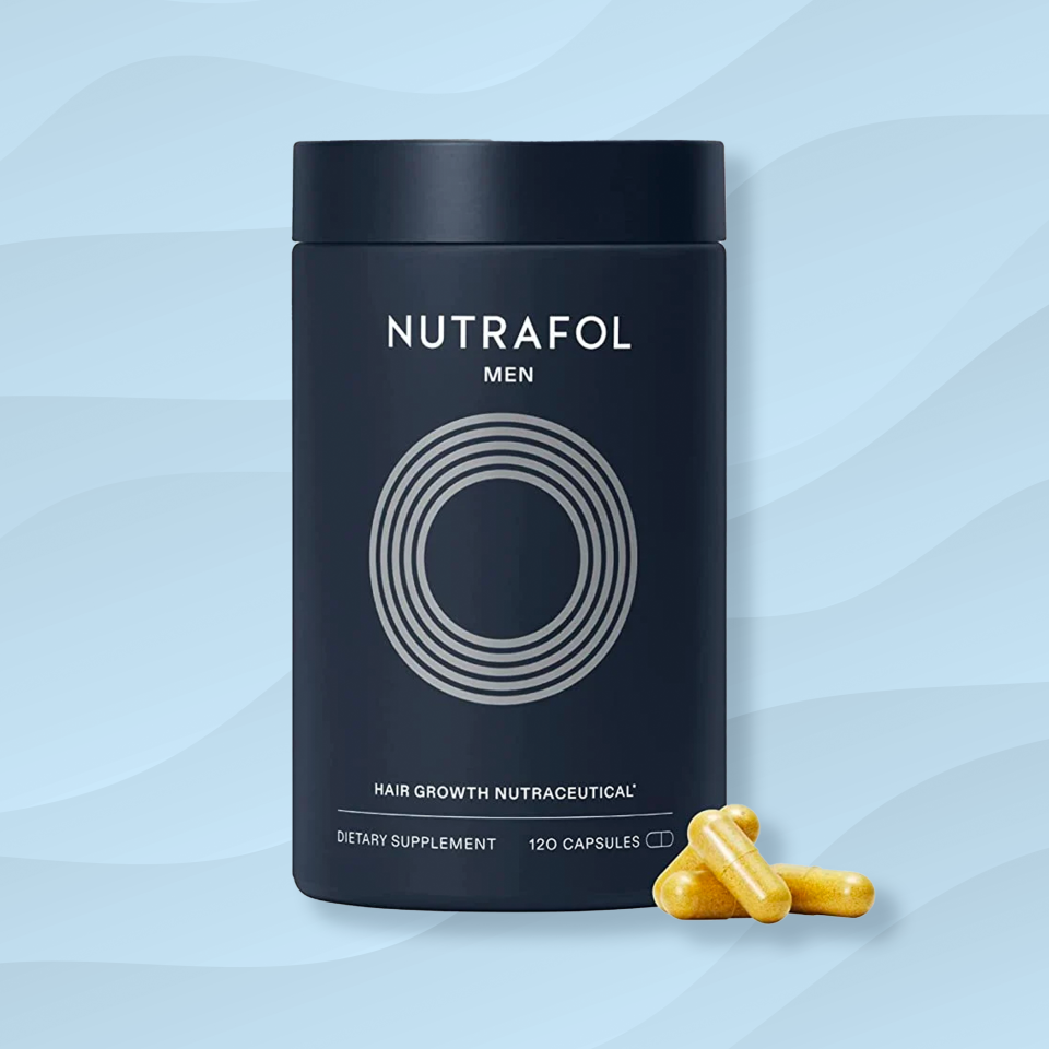 a bottle of the nutrafol hairloss treatment for men