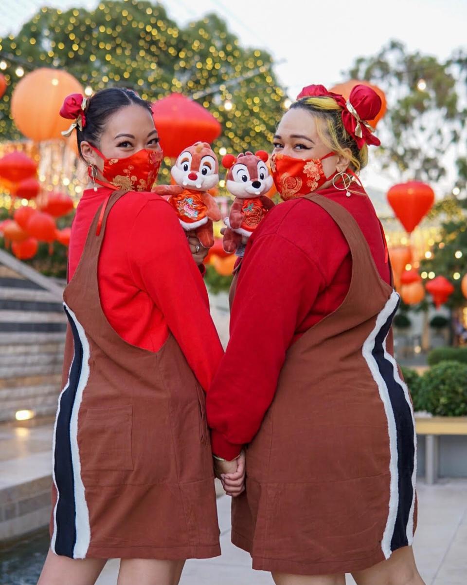 Disney fan Dolly and her friend dress as Chip and Dale.