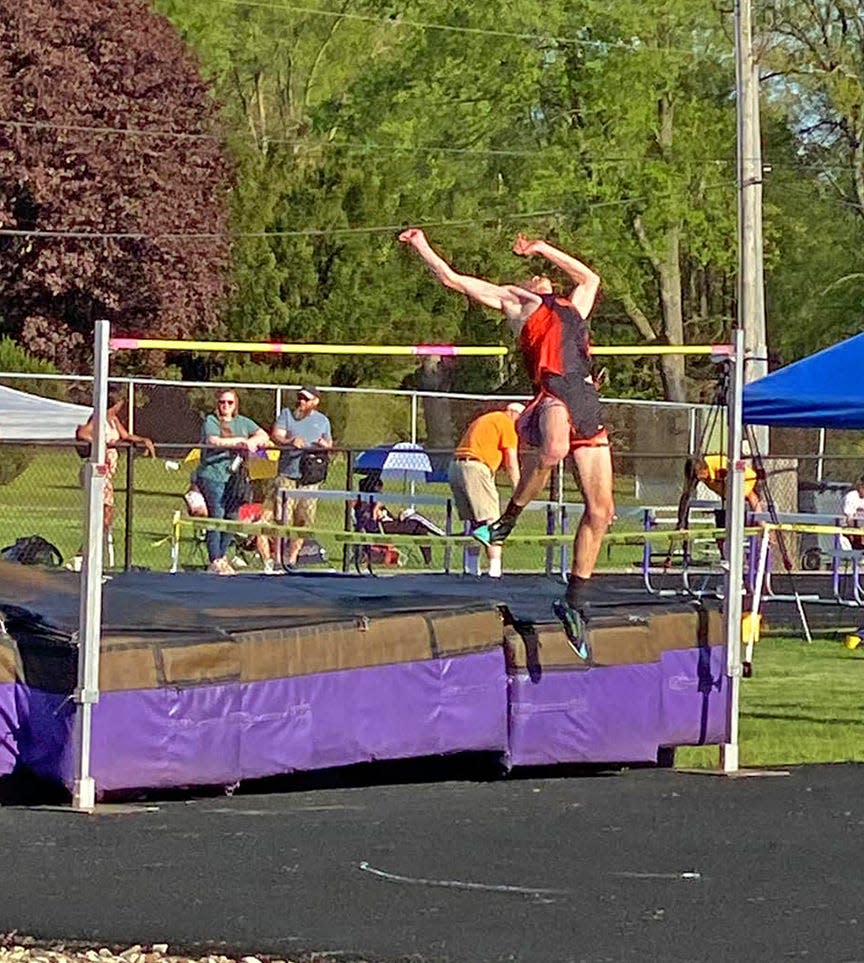 Quincy's Rhett Reif set a new personal best in the high jump Wednesday, clearing 6 feet in the second place finish.