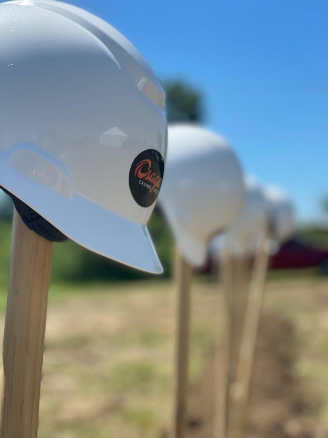 Hardhats and shovels at the site of the site of the new Osage Casino Bartlesville site on Oklahoma 60. The tribe broke ground on the casino Tuesday.