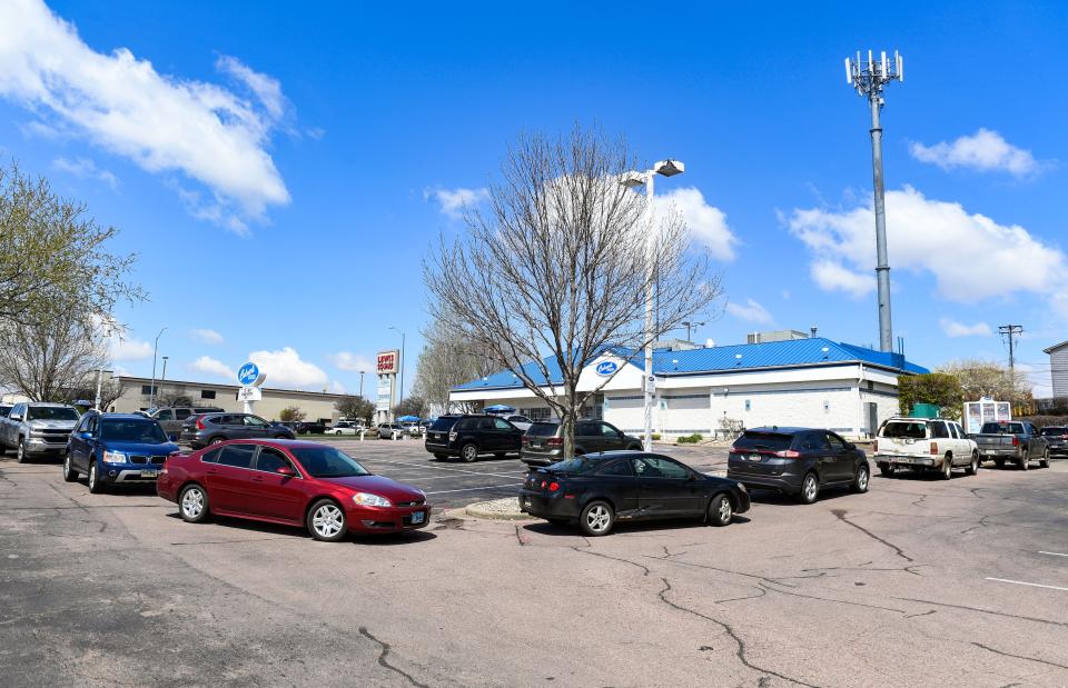Cars line up in the Culver's drive-thru lane in Sioux Falls, S.D. Business is booming for many fast-food chains and other restaurants where customers are in and out in minutes.