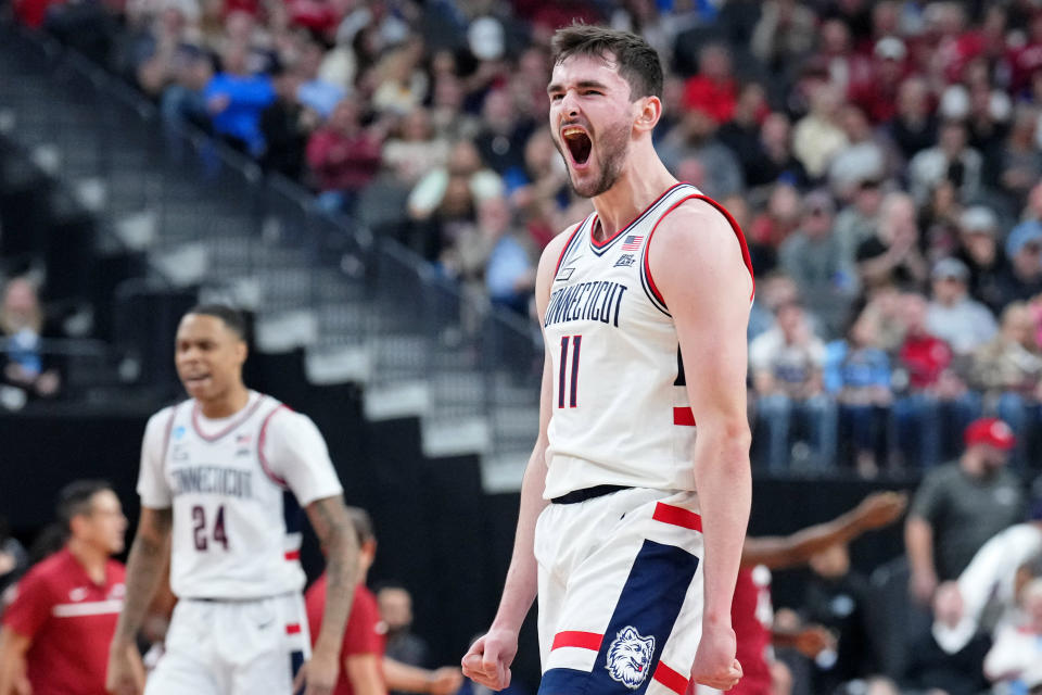 Mar 23, 2023; Las Vegas, NV, USA; UConn Huskies forward Alex Karaban (11) reacts after a play against the Arkansas Razorbacks during the first half at T-Mobile Arena. Mandatory Credit: Joe Camporeale-USA TODAY Sports