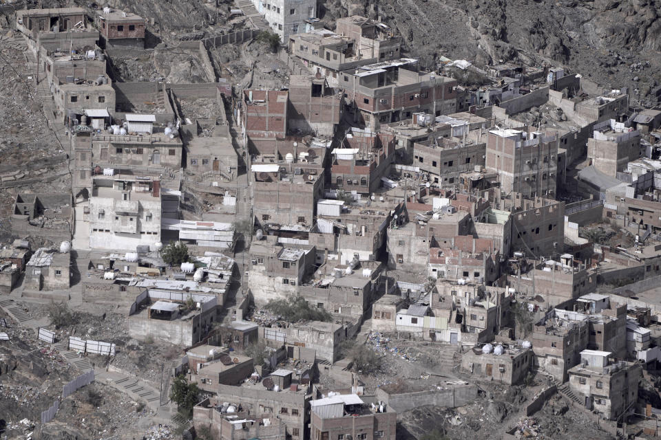 General view showing slums which on plan to be demolished to make way for towers in the Muslim holy city of Mecca, Saudi Arabia, Sunday, June 25, 2023. Saudi Arabia is pumping billions of dollars into the holy city of Mecca to meet its ambitious economic targets, with high-end hotels, apartment blocks, retailers and restaurants planned for areas around the Grand Mosque. (AP Photo/Amr Nabil)