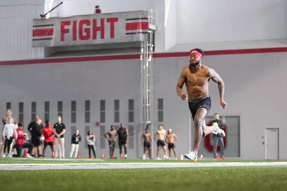 Mar 20, 2024; Columbus, Ohio, USA; Ohio State Buckeyes wide receiver Xavier Johnson runs the 40 during Pro Day at the Woody Hayes Athletic Center.