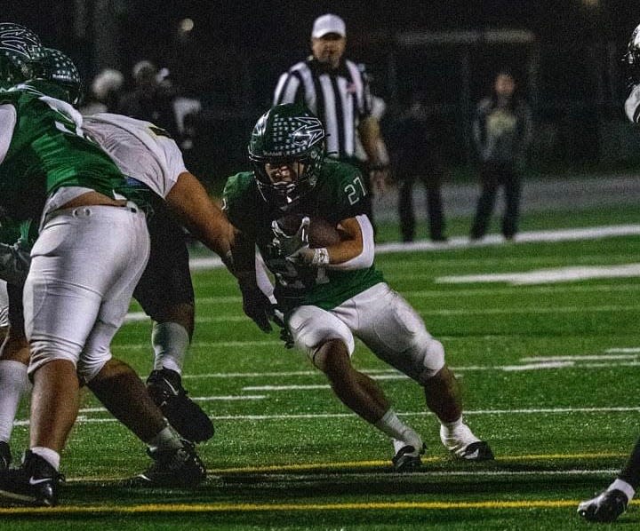 Pacifica's Philip Kim finds a hole in the Cajon defense during a CIF-Southern Section Division 3 first-round football game on Friday, Nov. 3, at Pacifica High. The Tritons lost, 27-17, to end their season at 10-1.