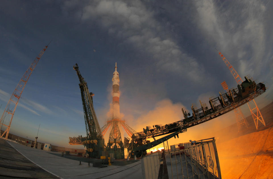 The Soyuz-FG rocket booster with Soyuz MS-11 space ship carrying a new crew to the International Space Station, ISS, blasts off at the Russian leased Baikonur cosmodrome, Kazakhstan, Monday, Dec. 3, 2018. The Russian rocket carries U.S. astronaut Anne McClain, Russian cosmonaut Оleg Kononenko‎ and CSA astronaut David Saint Jacques. (AP Photo/Dmitri Lovetsky)