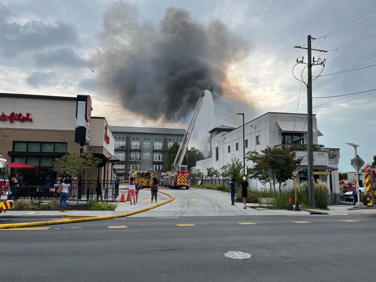 Dozens displaced by fire at luxury apartments behind Atlanta Chickfil