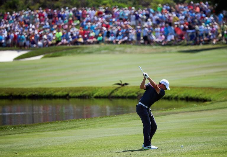 Rory McIlroy of Northern Ireland hits an approach shot on the sixth hole during the third round of the Arnold Palmer Invitational on March 21, 2015 in Orlando, Florida