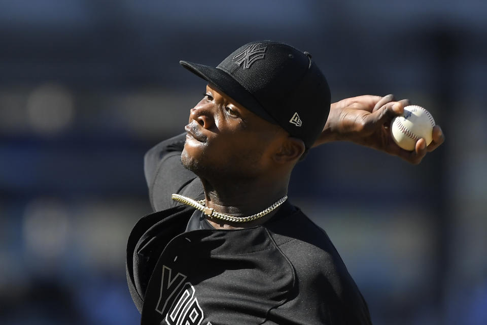 New York Yankees starting pitcher Domingo German throws to the plate during the first inning of a baseball game against the Los Angeles Dodgers Sunday, Aug. 25, 2019, in Los Angeles. (AP Photo/Mark J. Terrill)