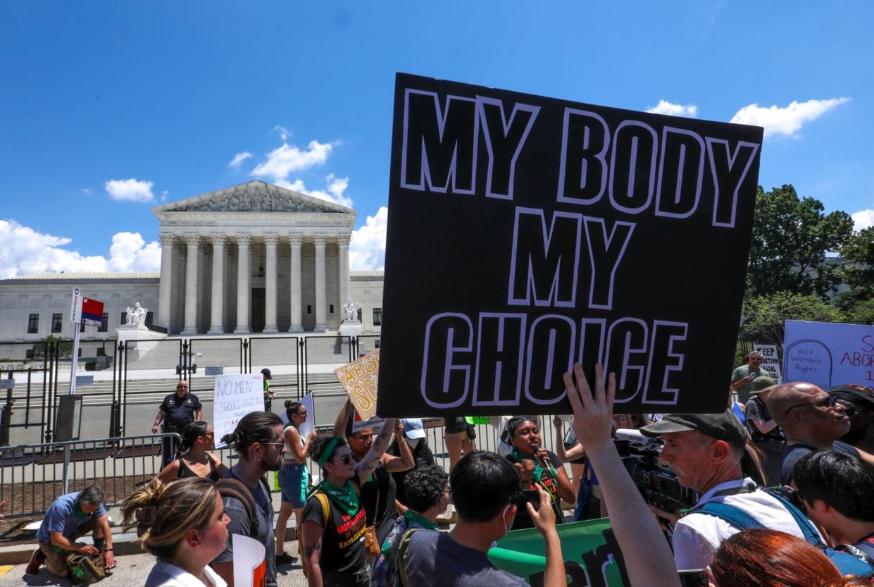 WASHINGTON, UNITED STATES - JUNE 25: Pro-life-abortion and abortion rights demonstrators gather in front of the US Supreme Court in Washington, DC, on June 25, 2022. (Photo by Yasin Ozturk/Anadolu Agency via Getty Images)