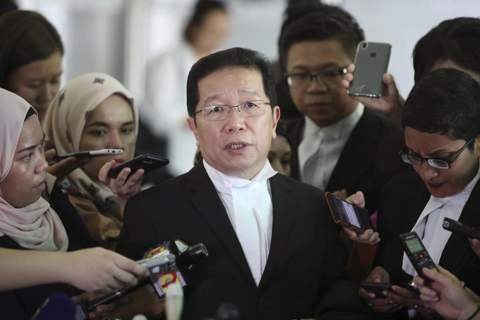 Gooi Soon Seng, lawyer for Indonesian defendant Siti Aisyah speaks during a press conference after a court hearing at Shah Alam High Court in Shah Alam, Malaysia, Thursday, Aug. 16, 2018. Aisyah and Vietnam's Doan Thi Huong, two Southeast Asian women on trial for the brazen assassination of the North Korean leader's half brother were told to begin their defense Thursday, extending the trial for several more months. (AP Photo/Jeffrey Ong)