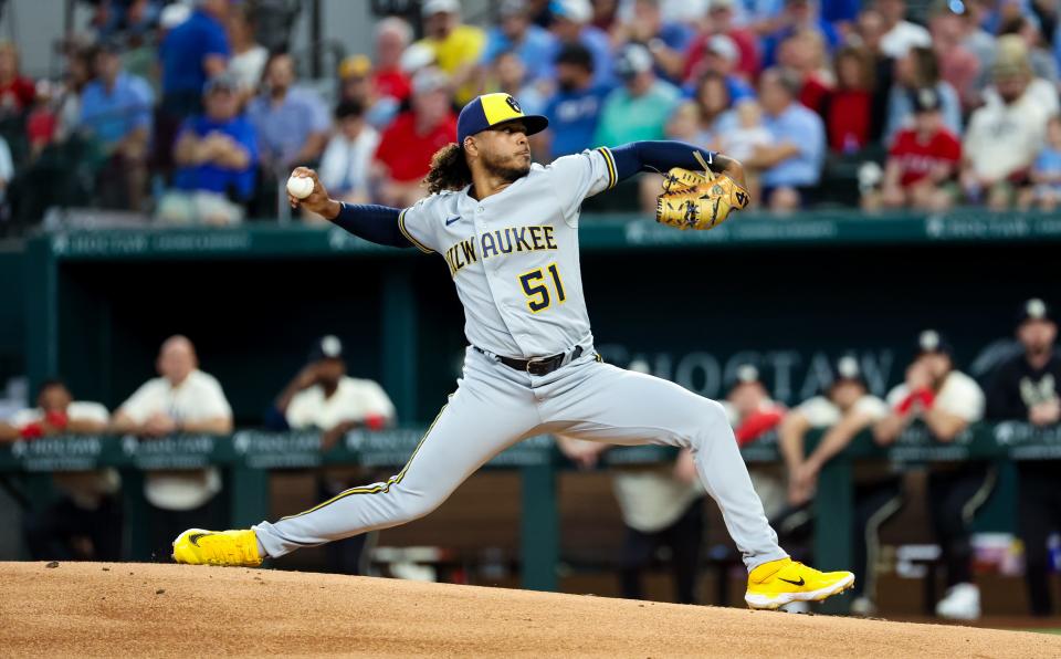 Brewers starting pitcher Freddy Peralta throws during the first inning Saturday.