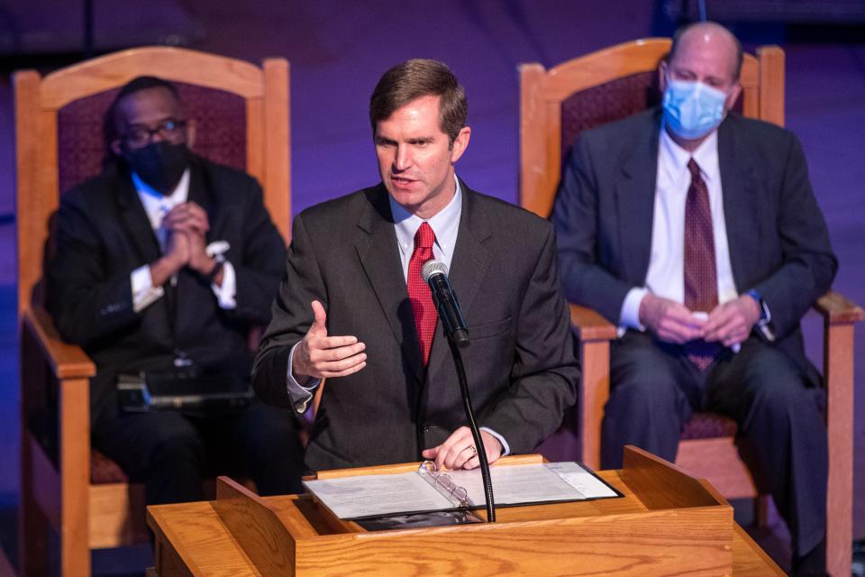 Gov. Andy Beshear speaks at the funeral service for civil rights activist and Kentucky's first Black assistant Attorney General, Darryl T. Owens, at St. Stephens Church on Tuesday. Jan. 11, 2022