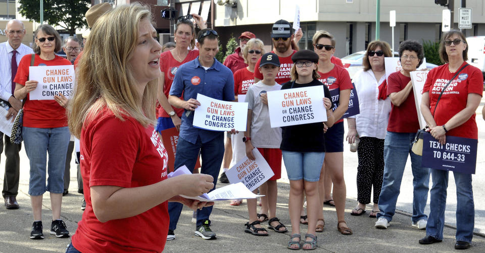 Tosha Pelfrey of Moms Demand Action speaks during a rally to protest gun violence n front of the United Building in Charleston, W.Va., Saturday, Aug. 17, 2019. (Chris Dorst/Charleston Gazette-Mail via AP)