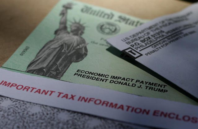 President Donald J.Trump's name is printed on a stimulus check issued by the IRS to help combat the adverse economic effects of the COVID-19 outbreak, Thursday, April 23, 2020, in  San Antonio. According to the Treasury Department, it marks the first time a president's name has appeared on any IRS payments, whether refund checks or other stimulus checks that have been mailed during past economic crises. (AP Photo/Eric Gay)