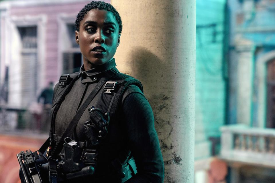 Lashana holding a weapon