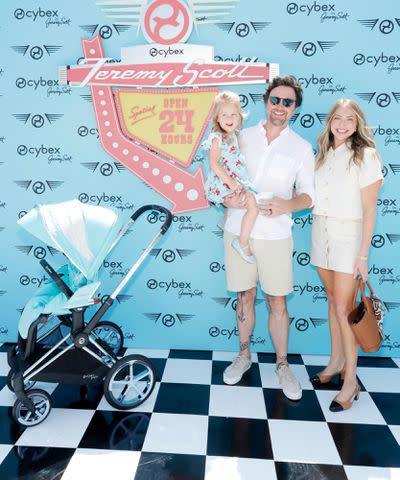 <p>Stefanie Keenan/Getty</p> Beau Clark, Stassi Schroeder and their daughter Hartford attend CYBEX Jeremy Scott Car Collection Launch Event on June 05, 2024