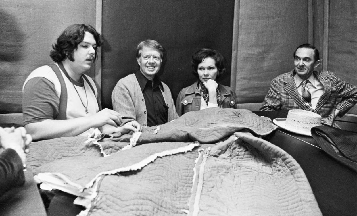 Carter, accompanied by his wife, Rosalynn, visits Capricorn Records in 1974.