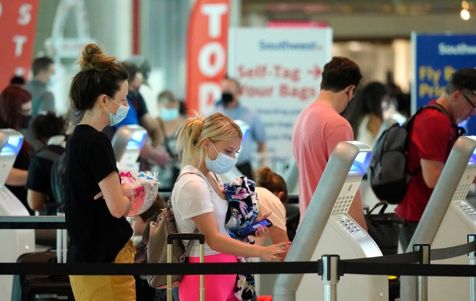 Travelers at Love Field airport in Dallas over Memorial Day weekend 2021.