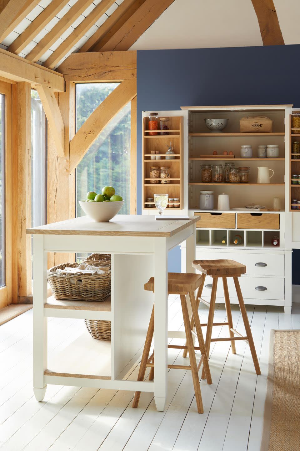 <p>Cosy, rustic and timeless, this country larder cupboard has all the right storage space for kitchen essentials. With two closing doors either side, it's great for keeping clutter away and displaying only your favourites (such as the wine bottles underneath). </p><p>• See more from <a href="https://www.dunelm.com/" rel="nofollow noopener" target="_blank" data-ylk="slk:Dunelm;elm:context_link;itc:0;sec:content-canvas" class="link ">Dunelm</a> </p>