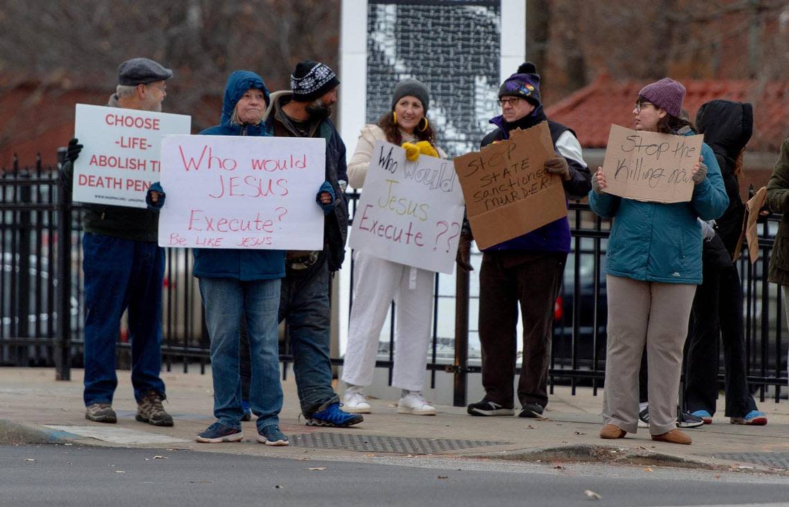 People protest the planned execution of Missouri prisoner Kevin Johnson on Tuesday, Nov. 29, 2022, in Kansas City.