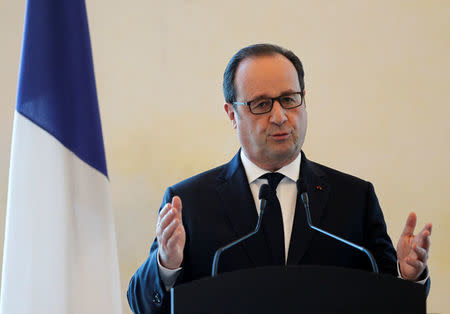 French President Francois Hollande gestures as he speaks during a joint news conference with Malaysia's Prime Minister Najib Razak in Putrajaya, Malaysia March 28, 2017. REUTERS/Lai Seng Sin