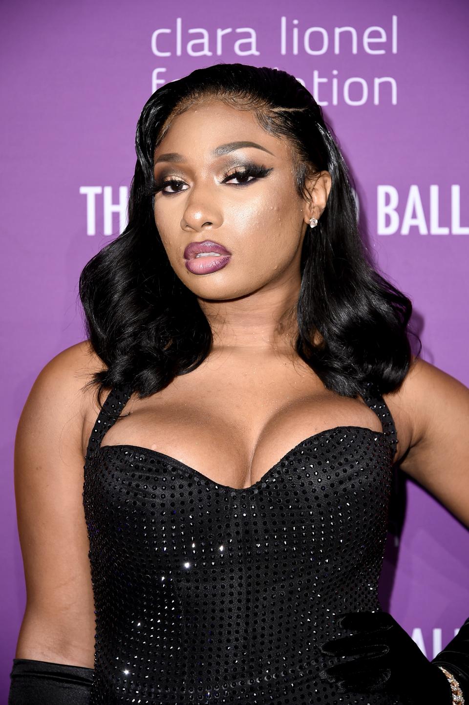Megan Thee Stallion pairs plum and pink for a sultry ombré lip at Rihanna's 5th annual Diamond Ball in New York in 2019.