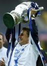 FC Zurich's coach Urs Meier shouts lifts the trophy after winning their Swiss Cup final soccer match against FC Basel in the Stade de Suisse stadium in Bern April 21, 2014. REUTERS/Ruben Sprich