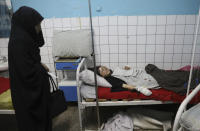 An Afghan school student is treated at a hospital after a bomb explosion near a school west of Kabul, Afghanistan, Saturday, May 8, 2021. A bomb exploded near a school in west Kabul on Saturday, killing several people, many them young students, an Afghan government spokesmen said. (AP Photo/Rahmat Gul)