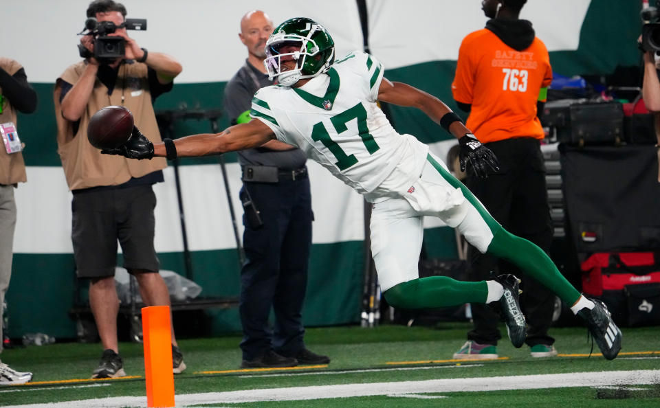 Oct 1, 2023; East Rutherford, New Jersey, USA; New York Jets wide receiver Garrett Wilson (17) can not hold on to a pass against the Chiefs at MetLife Stadium. Mandatory Credit: Robert Deutsch-USA TODAY Sports