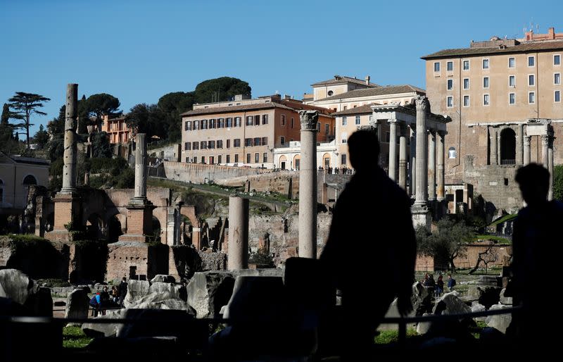 People walk in the Roman Forum