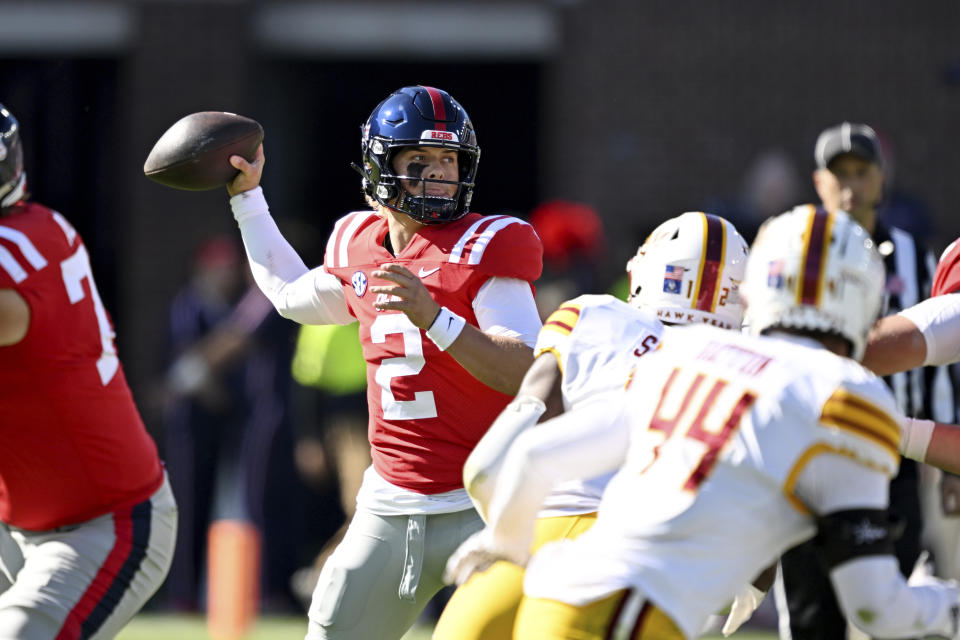 Mississippi quarterback Jaxson Dart (2) looks to pass during the first half of an NCAA college football game against Louisiana Monroe in Oxford, Miss., Saturday, Nov. 18, 2023. (AP Photo/Thomas Graning)