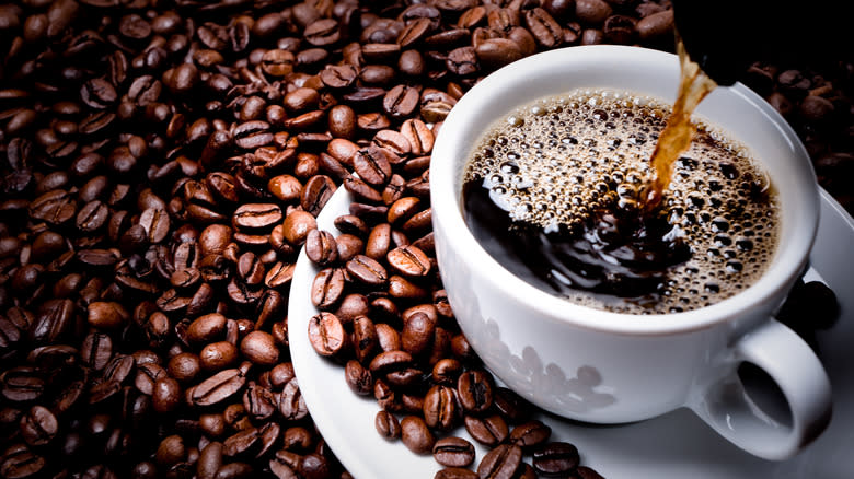 Coffee being poured into cup