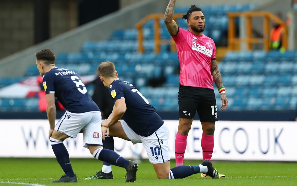 Millwall fans who booed Black Lives Matter protest condemned by Football Association - GETTY IMAGES