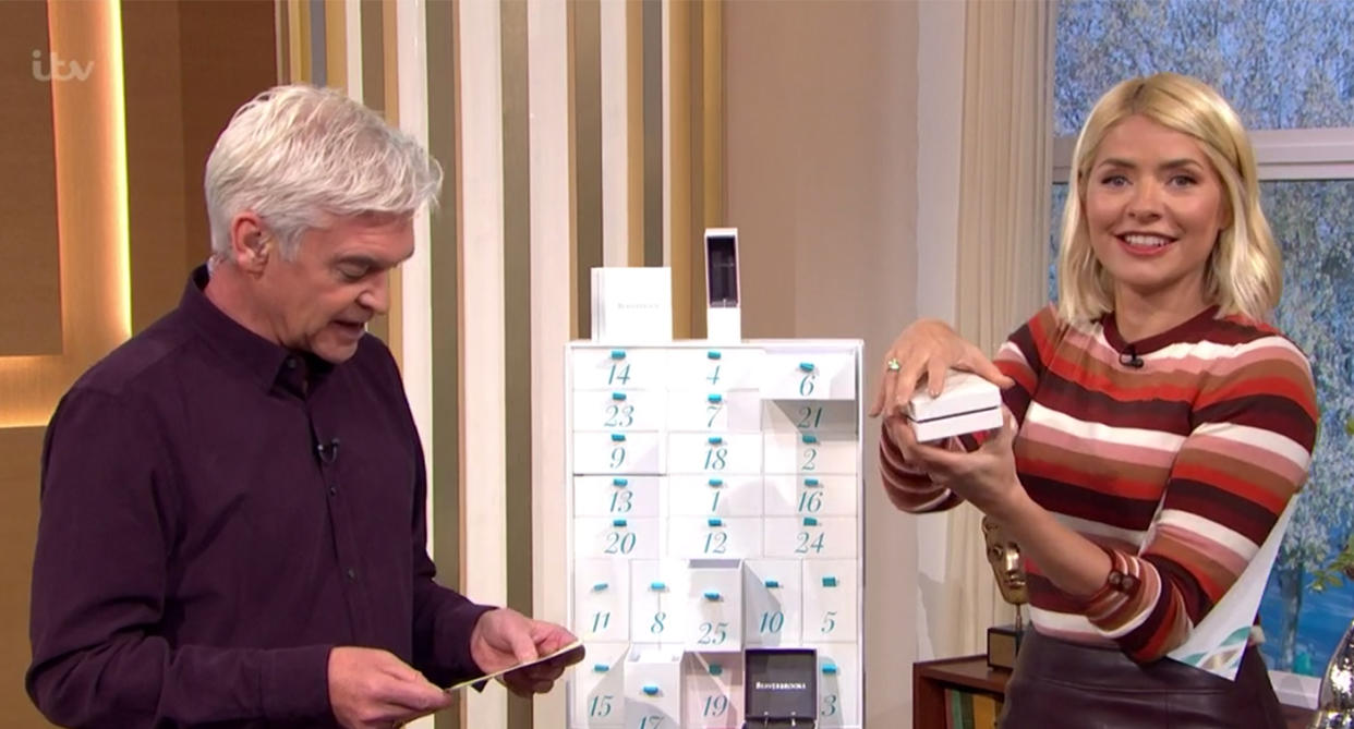 Holly Willoughby wears a £27 jumper from Warehouse on This Morning today [Photo: ITV]