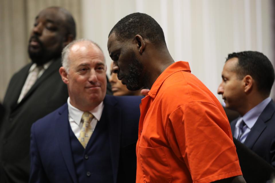 R. Kelly with his lead attorney, Steven Greenberg, during a hearing in state court on Sept. 17, 2019 in Chicago.