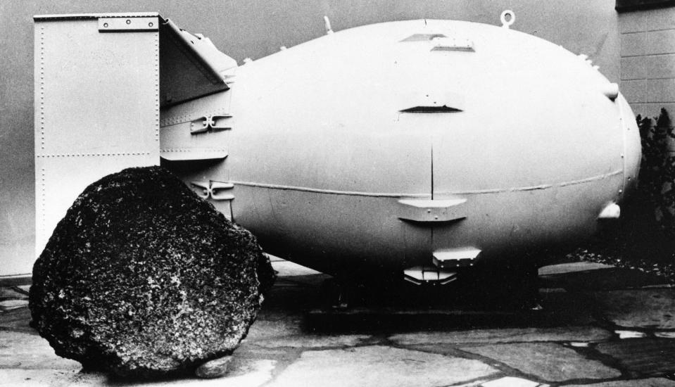 FILE - A "Fat Man" nuclear bomb of the type tested at Trinity Site, New Mexico, and dropped on Nagasaki, Japan in 1945, is on view for the public at the Los Alamos Scientific Laboratory Museum, Oct. 15, 1965. The Biden administration has reversed a decades-old decision to revoke the security clearance of Dr. J. Robert Oppenheimer, the physicist called the father of the atomic bomb for his leading role in World War II’s Manhattan Project. (AP Photo, File)