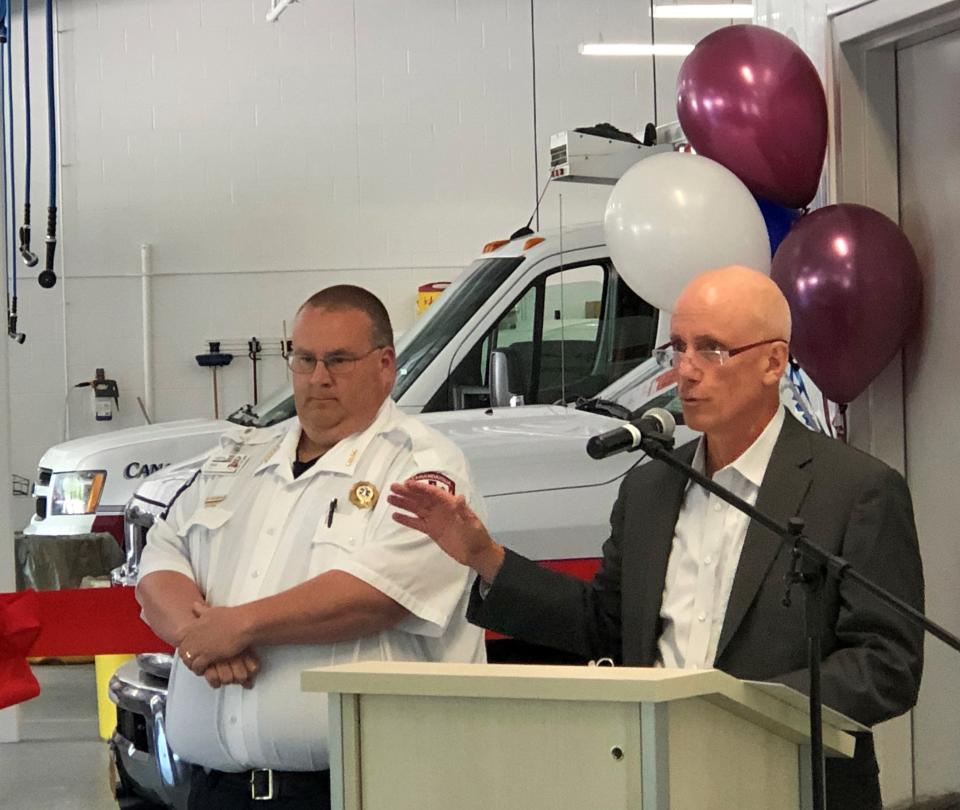 Canandaigua Emergency Squad Board of Directors President Chris O'Donnell, flanked by Chief Matt Sproul, points out some of the reasons why a new, larger headquarters is necessary.