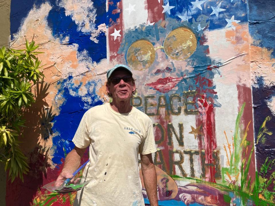 Christopher Gunkel, 69, was painting a mural on a building in downtown Fort Pierce just east of the railroad tracks Friday. He is a Brightline fan. “We need more transit. We need relief from traffic. The interstates are plugged. I don't like driving on them.” The passenger high-speed train made its inaugural journey through the Treasure Coast Sept. 22, 2023.