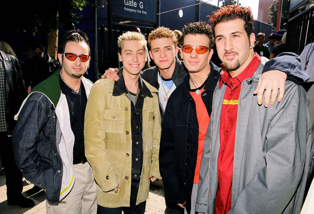 Lance Bass, second from left, poses with *NSYNC members Chris Kirkpatrick, Justin Timberlake, JC Chasez and Joey Fatone at the 1999 Kids' Choice Awards. (Photo: Jeff Kravitz/FilmMagic)
