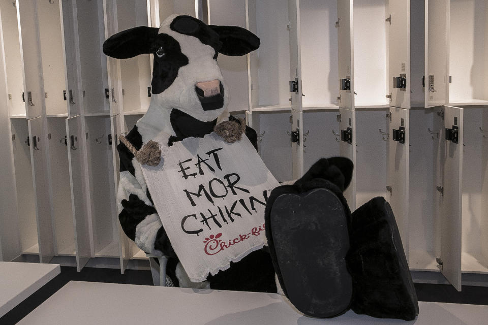 <p>The Chick-fil-A Cow makes himself comfortable at Yahoo offices in New York City on Sept. 25, 2017. (Photo: Gordon Donovan/Yahoo News) </p>