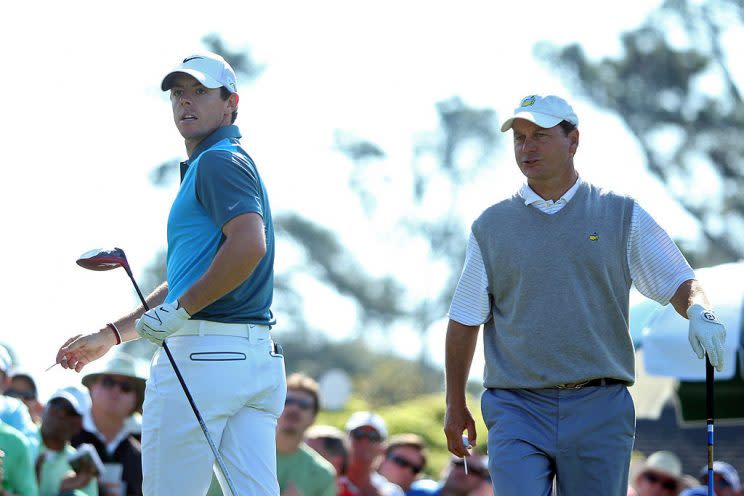 In this 2014 photo, Jeff Knox plays with Rory McIlroy at the Masters. (Getty)