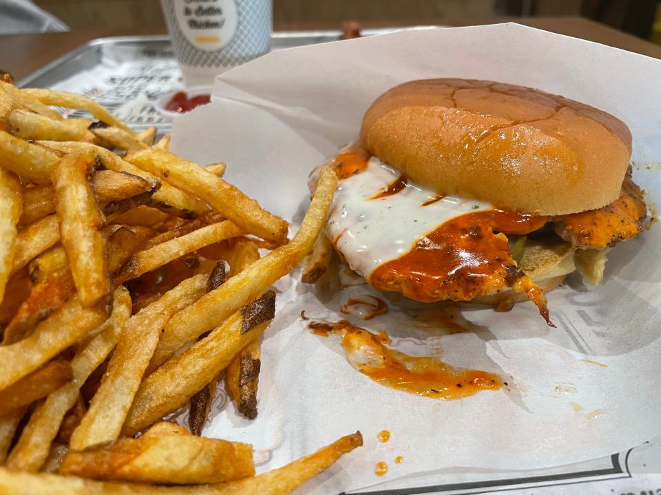 Super Chic Chicken & Custard on Clinton Highway offers a variety of chicken sandwiches, tenders and custard treats. Pictured here: Buffalo Ranch sandwich and fries, which includes a chicken fillet tossed in Buffalo sauce, layered with pickles and topped with buttermilk ranch sauce.